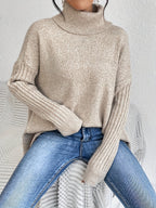 Women's Oversized Roll-Neck Jumper with Asymmetric Hem