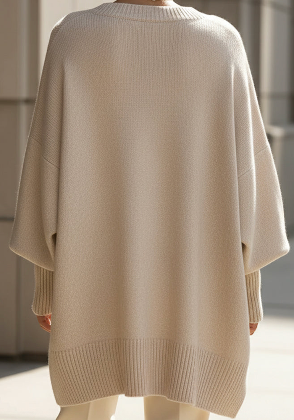 Women's Oversized Batwing Jumper with Asymmetric Hem