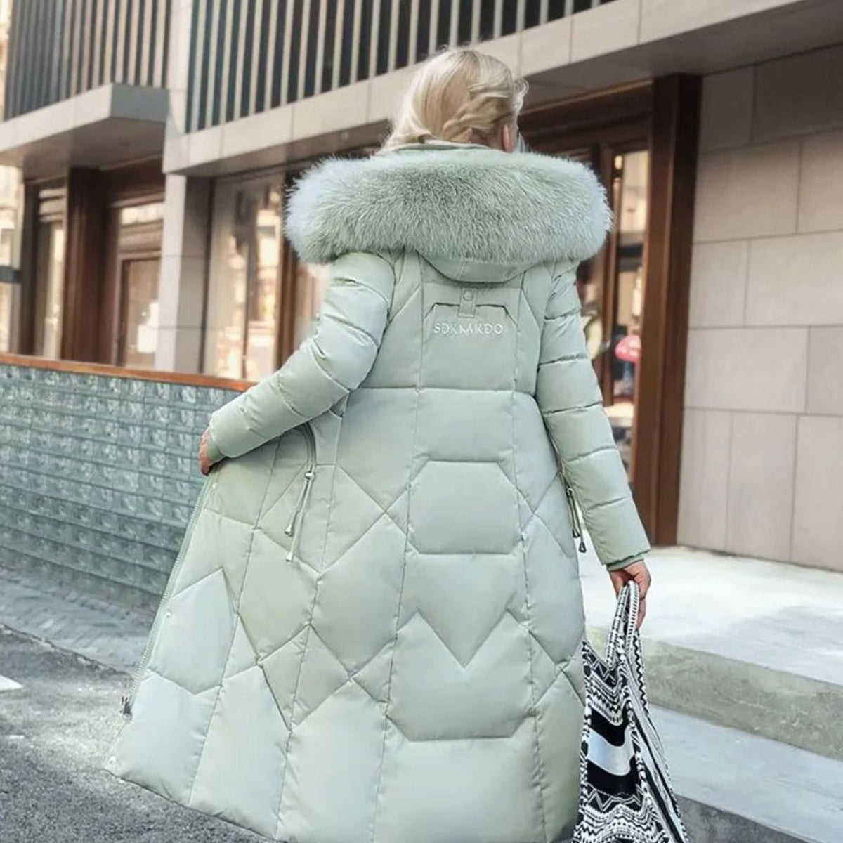 Women's Knee-Length Quilted Puffer Coat with Faux Fur Hood Trim