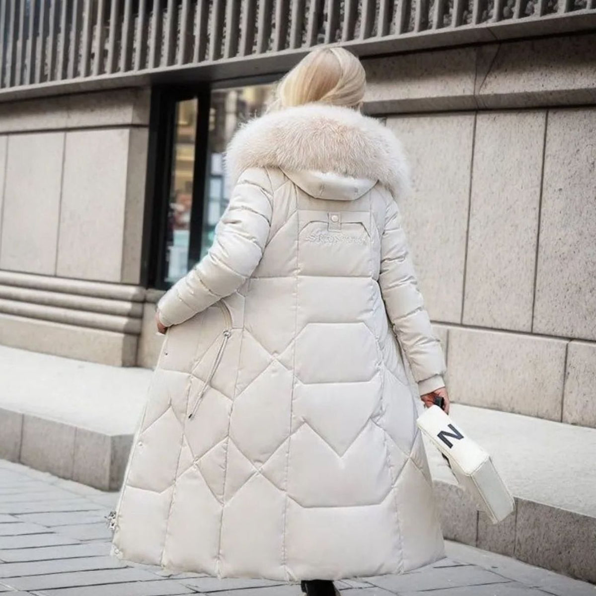 Women's Knee-Length Quilted Puffer Coat with Faux Fur Hood Trim